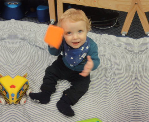 toddler playing a toy